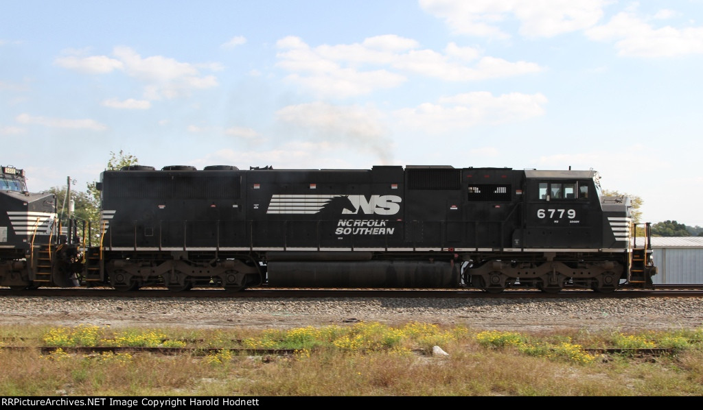 NS 6779 ieads train 119 southbound